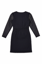 Black dress back flat lay
